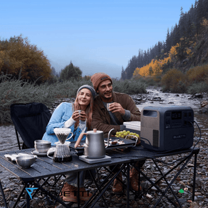 Bluetti Elite 200 V2 with couple near a river