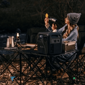 Bluetti Elite 200 V2 with couple using hairdryer while camping