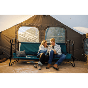 Extra Large Disc-O-Bed Portable Cot System benched with couple sitting