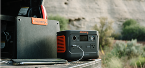 Jackery Explorer 300 Plus charging phone outdoors