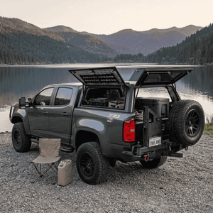 Overland Vehicle Systems Expedition Truck Cap for 2015 to 2022 GM Colorado/Canyon - 5 ft. Bed parked with panels opened