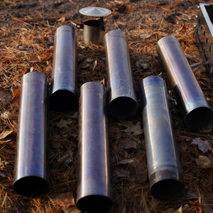 Multiple Stove Chimney Pipe laying on the floor