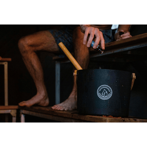 Sauna in Nature Essential Oil Blend Being Added to Water