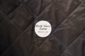 North Shore Sauna Logo on Stove Carrying Bag