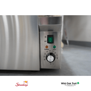 Stromberg's Electric Chicken Scalder switch and temperature dial close up view