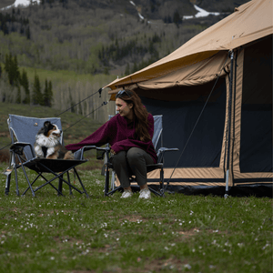 White Duck Outdoors Altimus Bell Tent outdoors with woman and her dog
