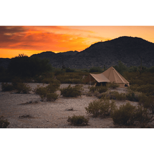 White Duck Outdoors Bell Tent Awning Sandstone Beige with a mountain in the background
