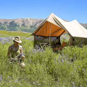 White Duck Outdoors Rover Scout Tent placed in flower field