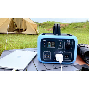 Photo of Bluetti - AC50S 500Wh/300W Portable Power Station hooked in a macbook.