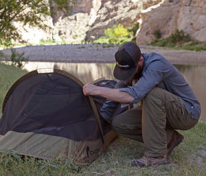Photo of the Catoma Burrow tent being set up.