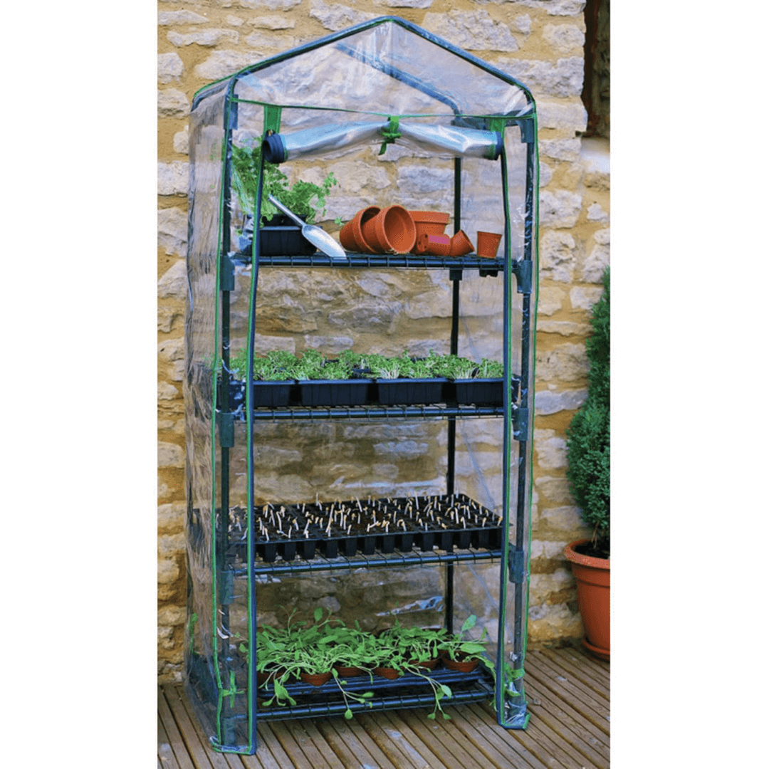 4 Tier Portable Rolling Greenhouse with Clear Cover and plants inside