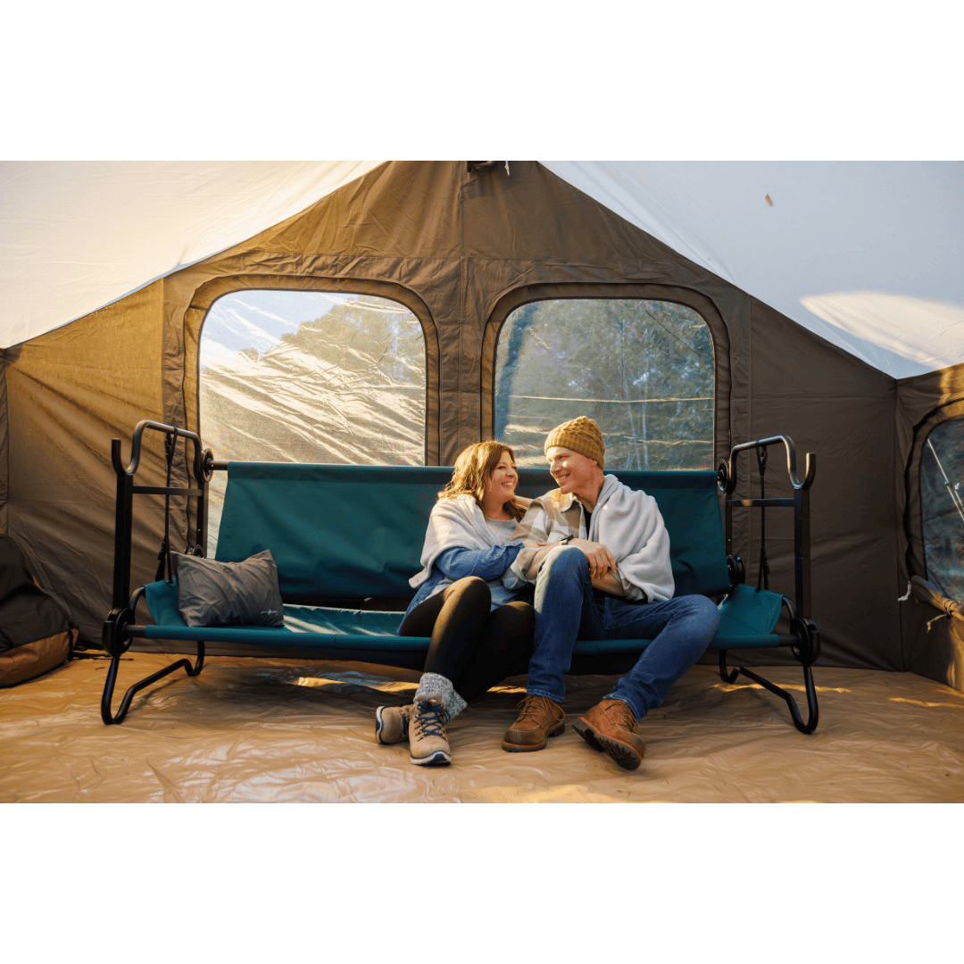 Extra Large Disc-O-Bed Portable Cot System benched with couple sitting