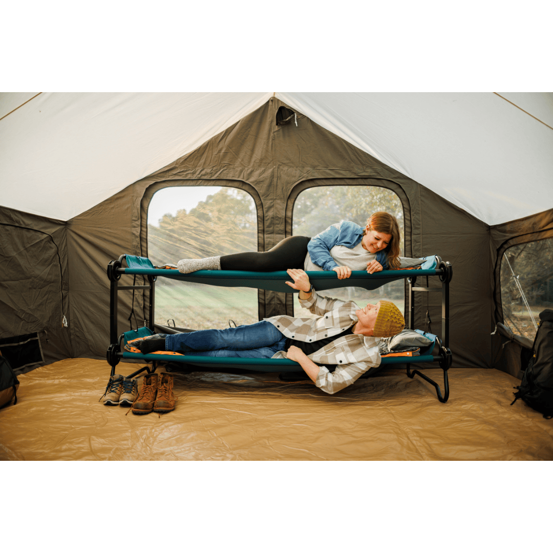 Extra Large Disc-O-Bed Portable Cot System bunked inside tent with couple laying down