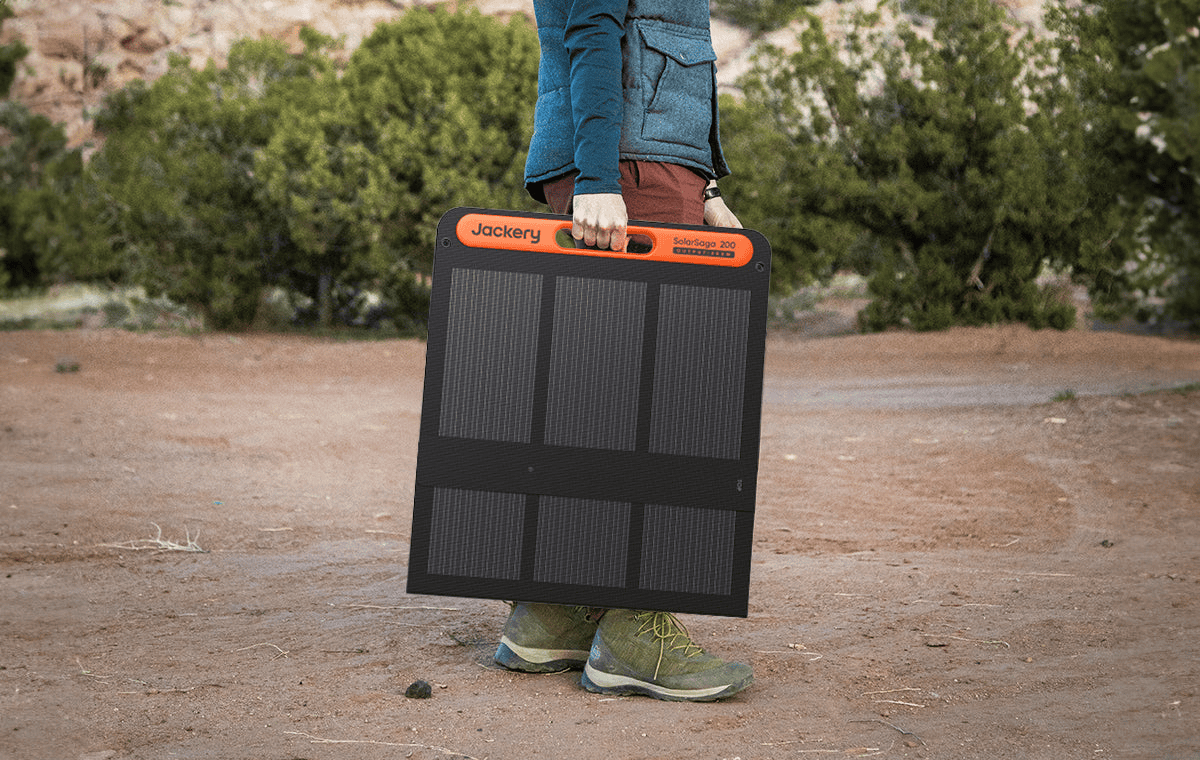 Jackery SolarSaga 200W Solar Panel being carried by man