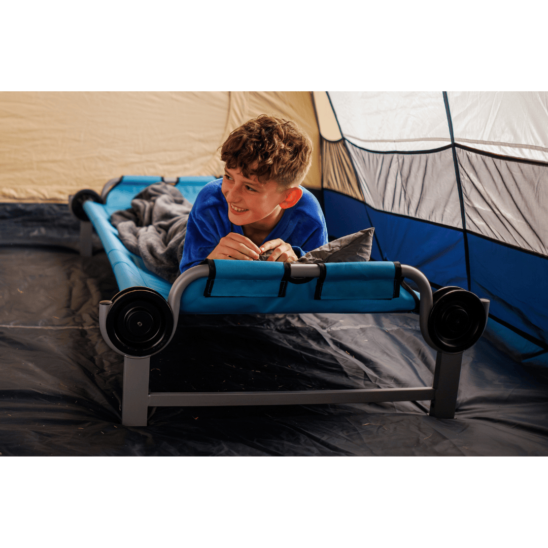 Kid-O-Bed single kids camping bunk bed being used by child inside camping tent