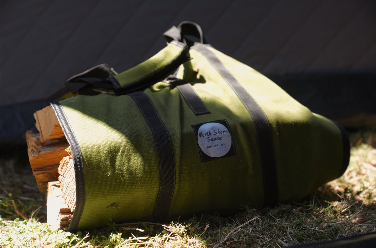 North Shore Sauna Firewood Carrying Bag with logs inside
