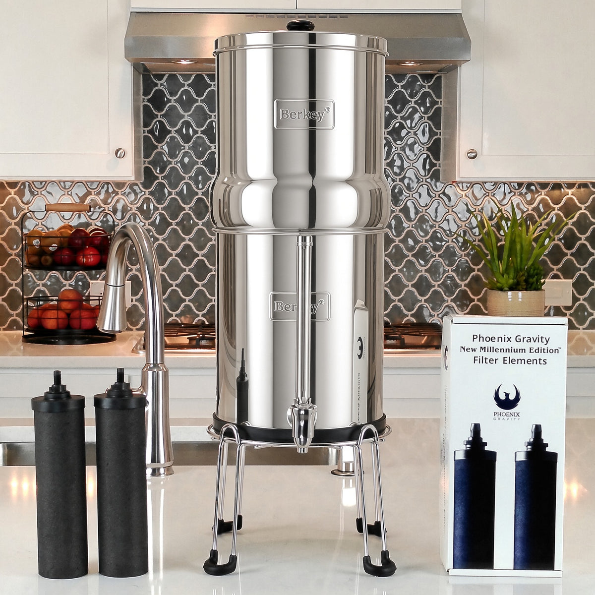 Berkey® system with Phoenix Gravity New Millennium Edition™ Filter Elements on a kitchen counter, shown with the optional stainless steel base and spigot