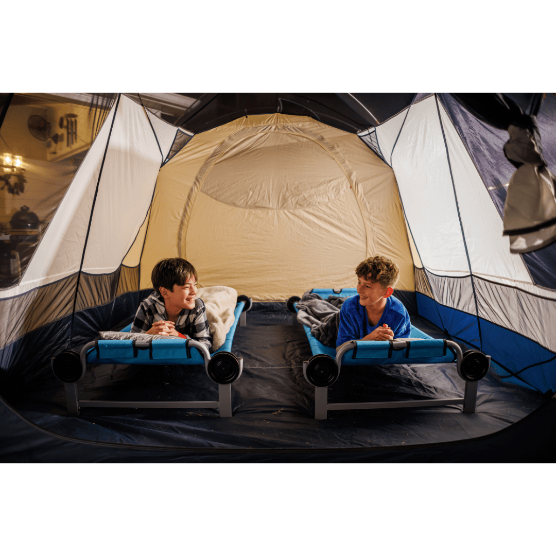 Two Kid-O-Bed single kids camping bunk beds being used by kids inside camping tent
