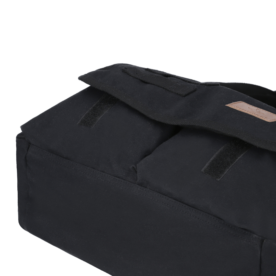 White Duck Outdoors Filios Messenger Bag close up of closed front pockets