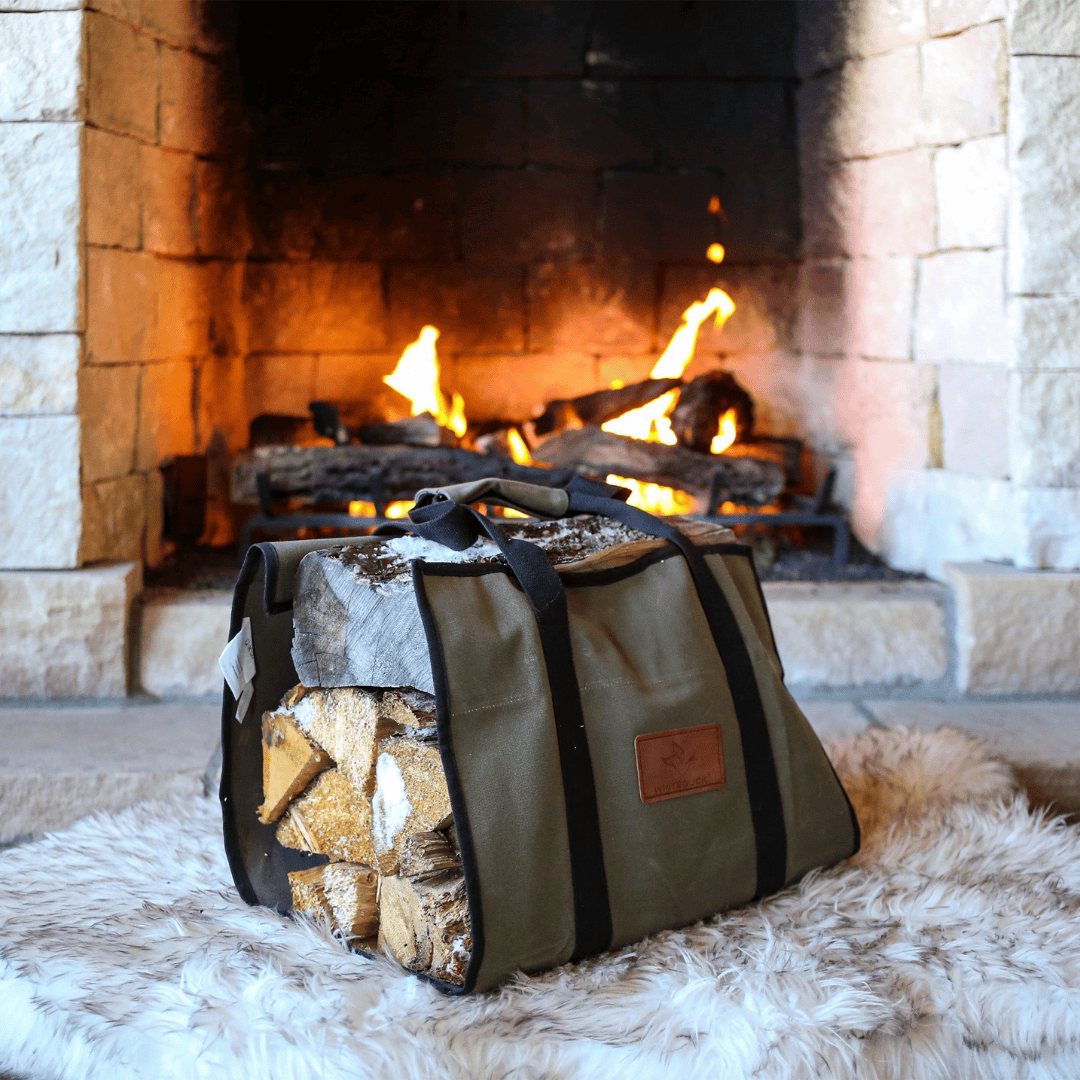 White Duck Outdoors Rectangle Canvas Log Carrier Bag Olive with Logs by a fireplace
