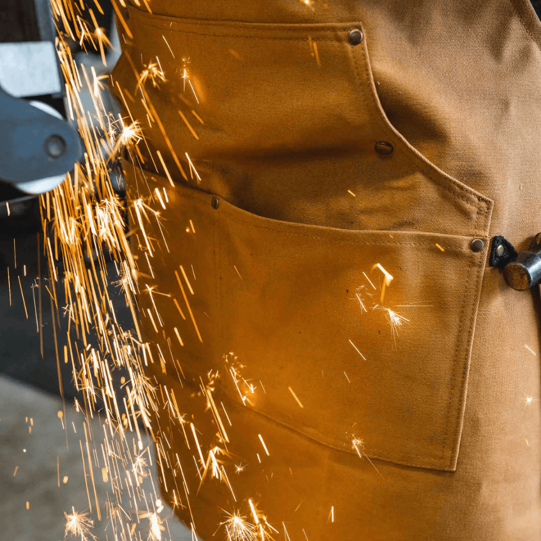 White Duck Outdoors Tan Work Apron against sparks from grinding