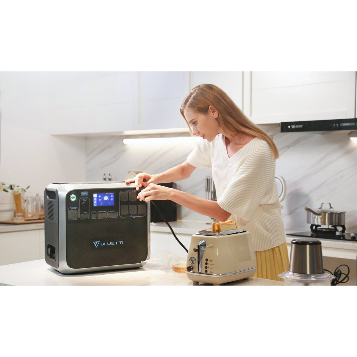 Photo of Bluetti - AC200 1700Wh/2000W Portable Power Station hooked in a bread toaster.