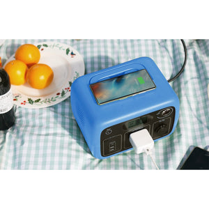 Photo of Bluetti - AC30 300Wh/300W Portable Power Station in color blue hooked in a mobile phone.