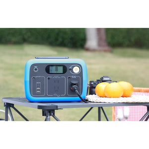 Photo of Bluetti - AC30 300Wh/300W Portable Power Station in color blue hooked in a camera.