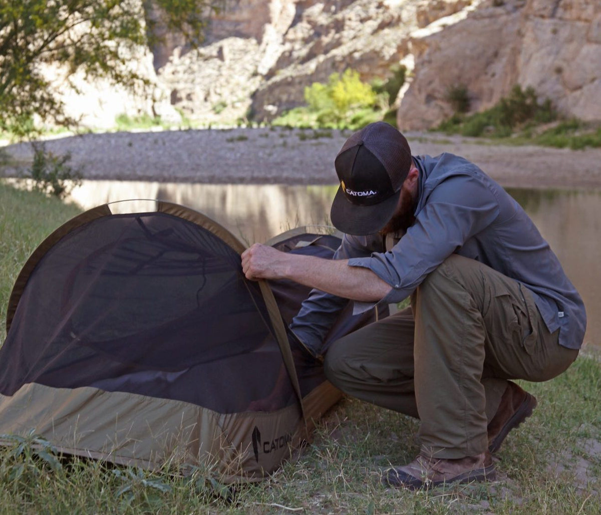 Photo of the Catoma Burrow tent being set up.