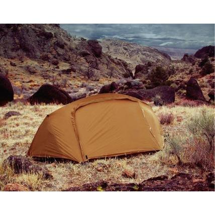 Photo of the front view of the Catoma Wolverine tent outdoor near a beach.