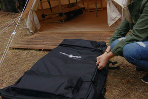 Photo of Disc-O-Bed 2XL Roller Bag on the ground.