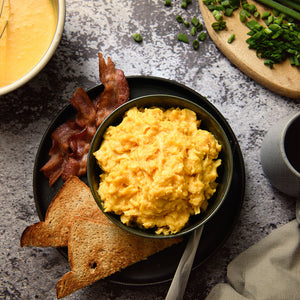 Photo of Nutrient Survival - Powdered Vitamin Eggs Blend in a bowl with Bacon and toast Breads, ready to eat.